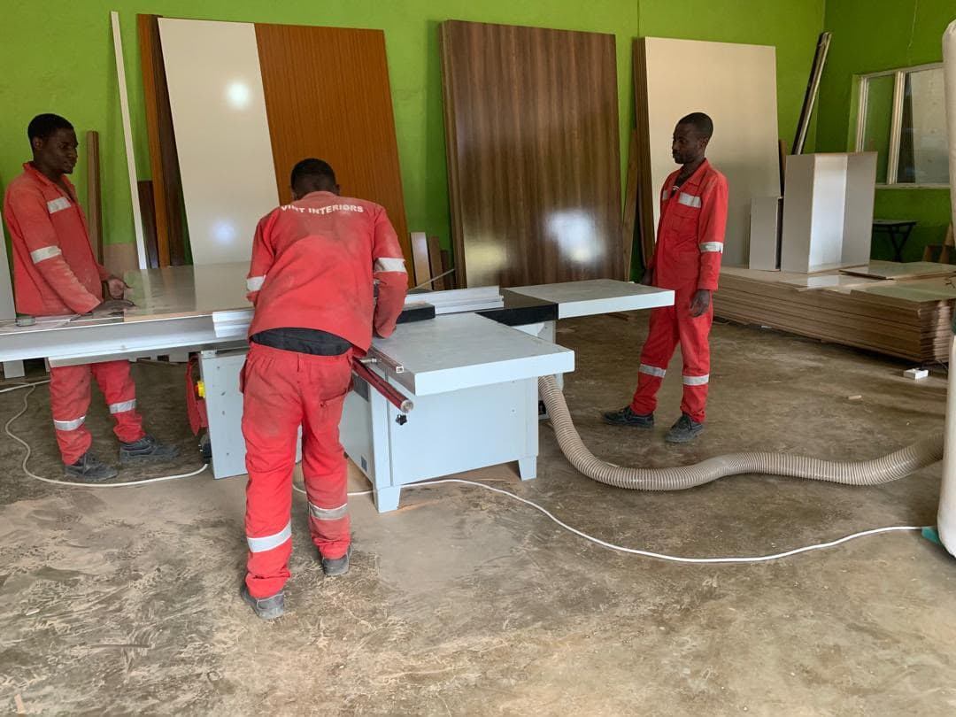 Vint Interiors team cutting boards to size in our Blantyre workshop